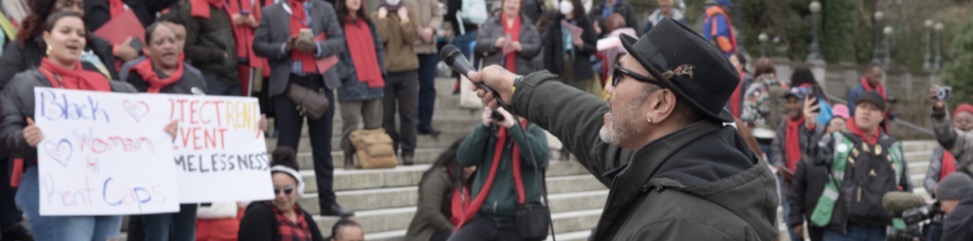 Advocates rally on the steps of the capitol building in Olympia.