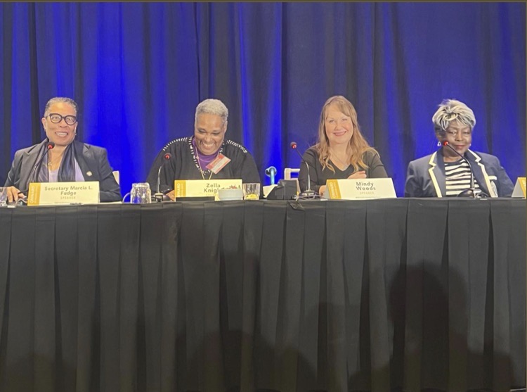 A panel including HUD Secretary Marcia Fudge and Mindy Woods.