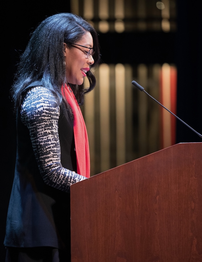 Board member Adria Buchanan speak to advocates gathered for Housing and Homelessness Advocacy Day in January 2024